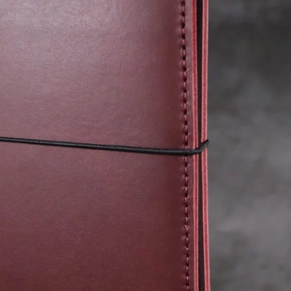 leather notebook cover elastic mahogany closeup