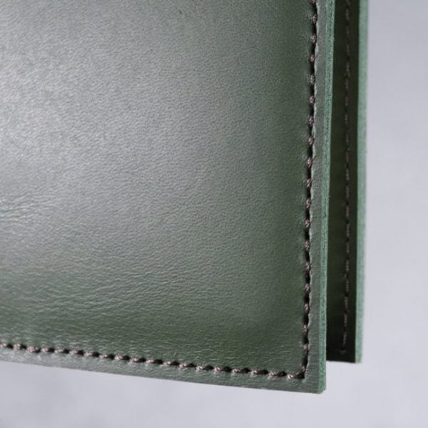 leather notebook cover forest closeup