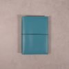 A6 teal blue leather journal with dark teal elastic closure