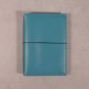 B6 teal blue leather journal with dark teal elastic closure