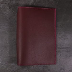 A5 red and fuchsia leather notebook closed none