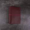 A6 red and fuchsia leather notebook closed elastic