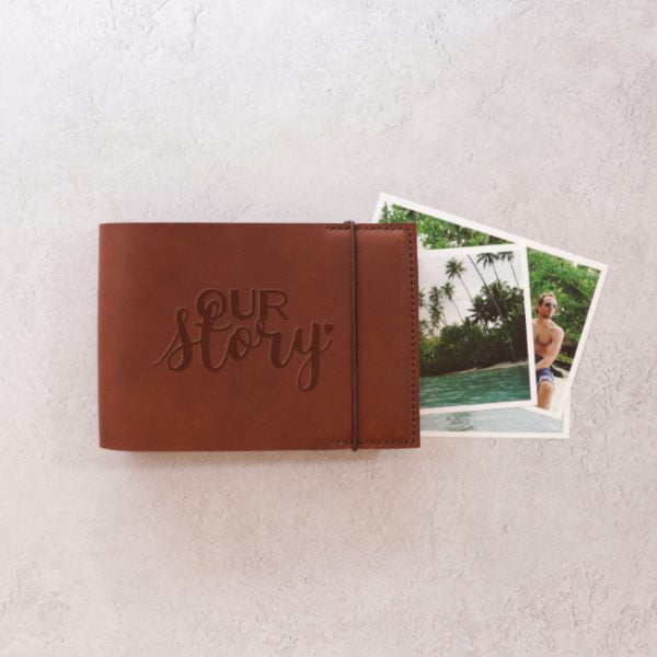 our story emboss brag book cognac leather