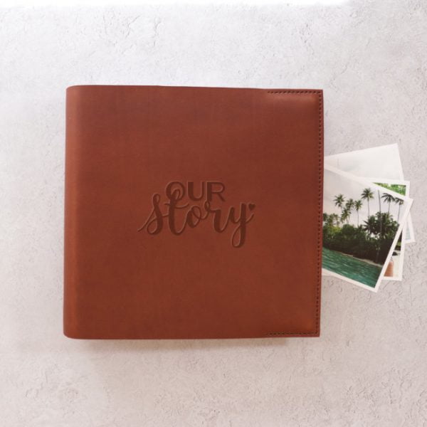 our story emboss photo album cognac leather