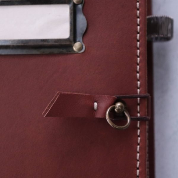 antique library brown leather journal closure detail