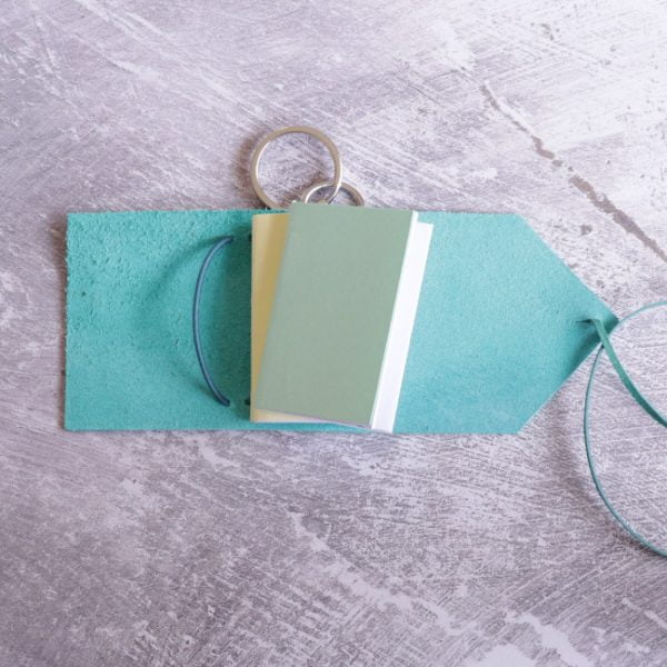 mini journal keyring - teal colour with notebooks