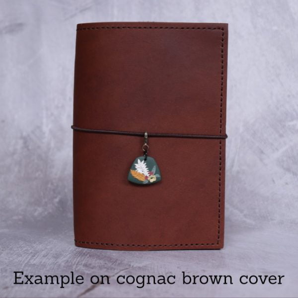nature journal charm - green - example on cognac