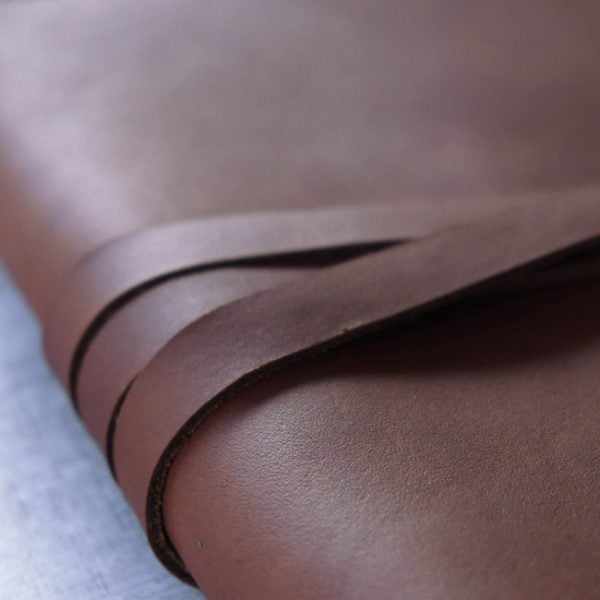 Cognac leather journal cover with tie close up