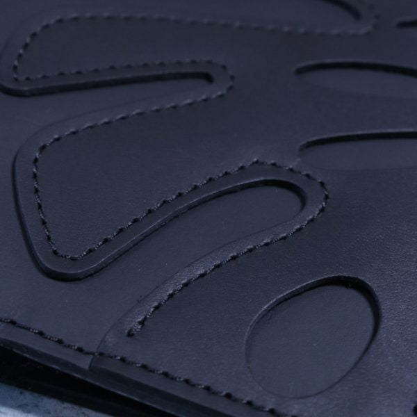 monstera black close up leather journal