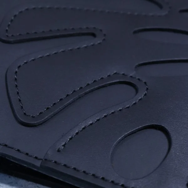 monstera black close up leather journal